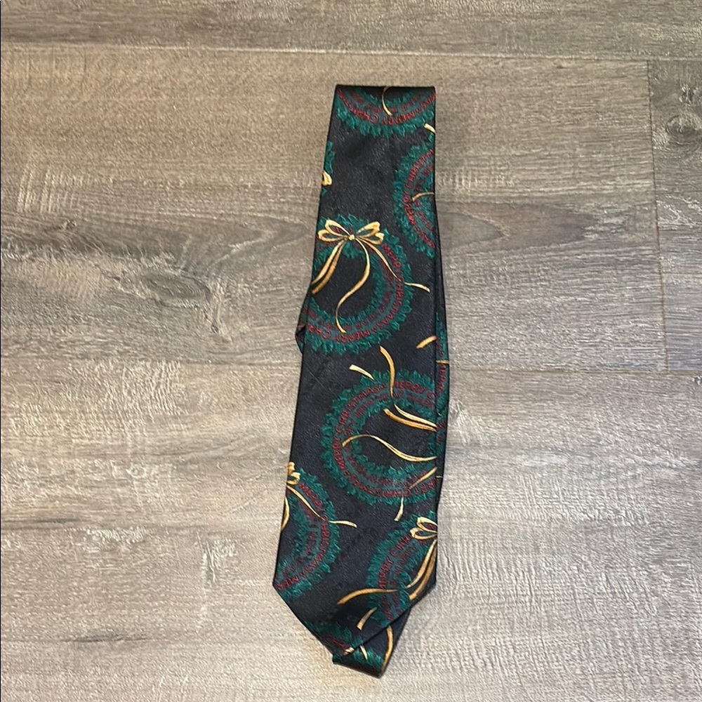 Stylish Black Tie with Gold and Green Accents